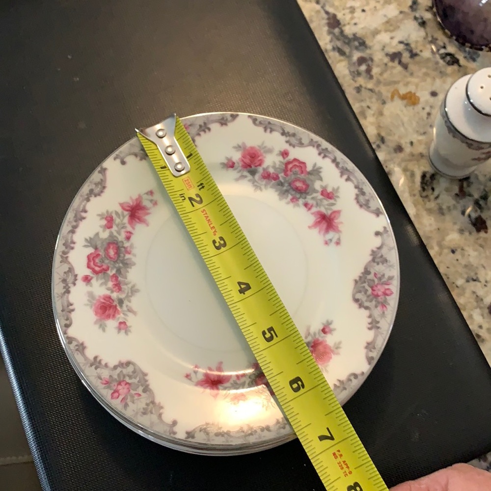 Meito China corsage pattern. 8 bread plates . No chips or cracks.